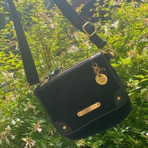 Juicy Couture Black satchel!!!!!!! Poka-Dot Interior soft material

ITEM #1